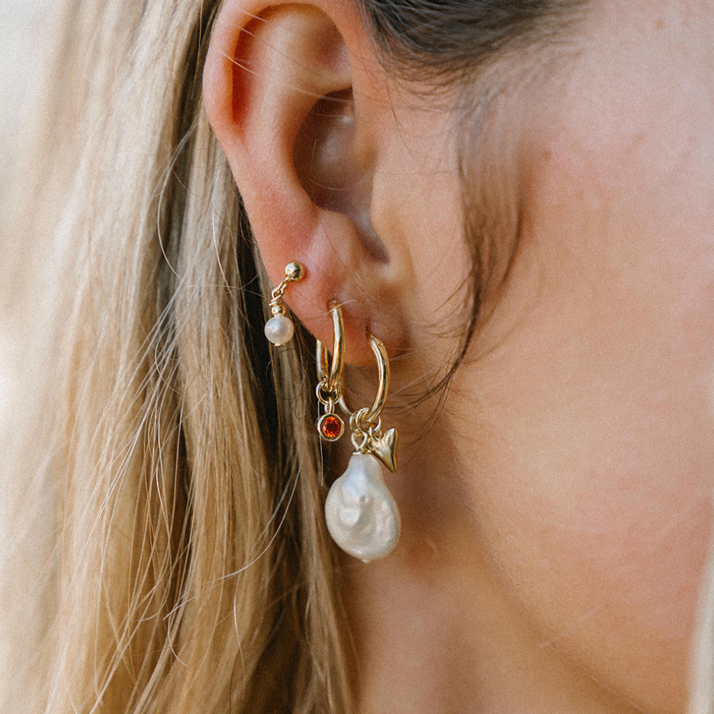 shark tooth earring charm stacked with a pearl earring charm