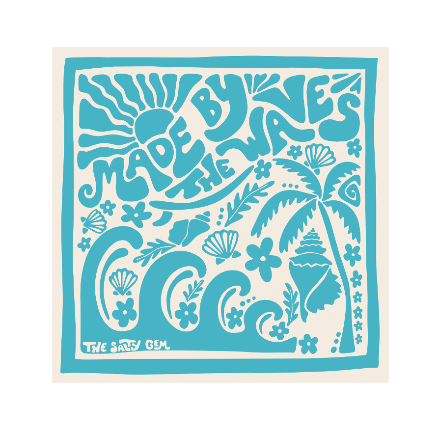 Decorative towel with ocean-themed design and 'Made by the Waves' text on a white background