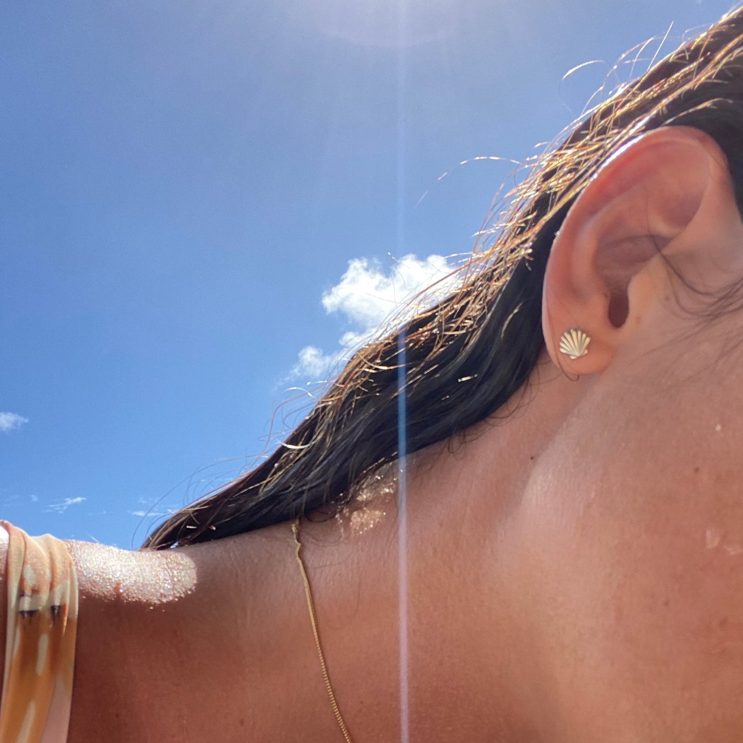 small seashell earrings worn during summer